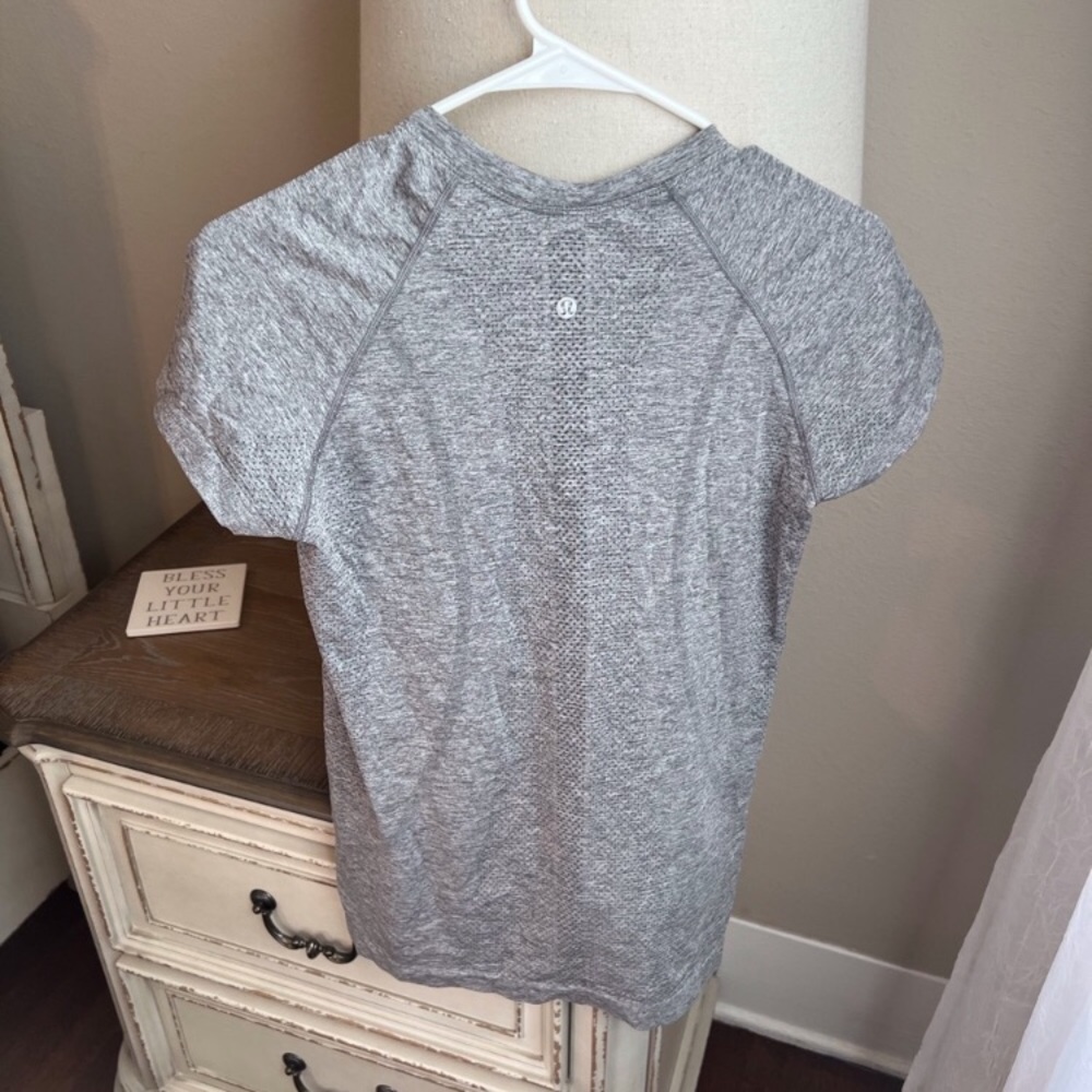 Two swiftly tech tees in good condition. No tags. Size 8